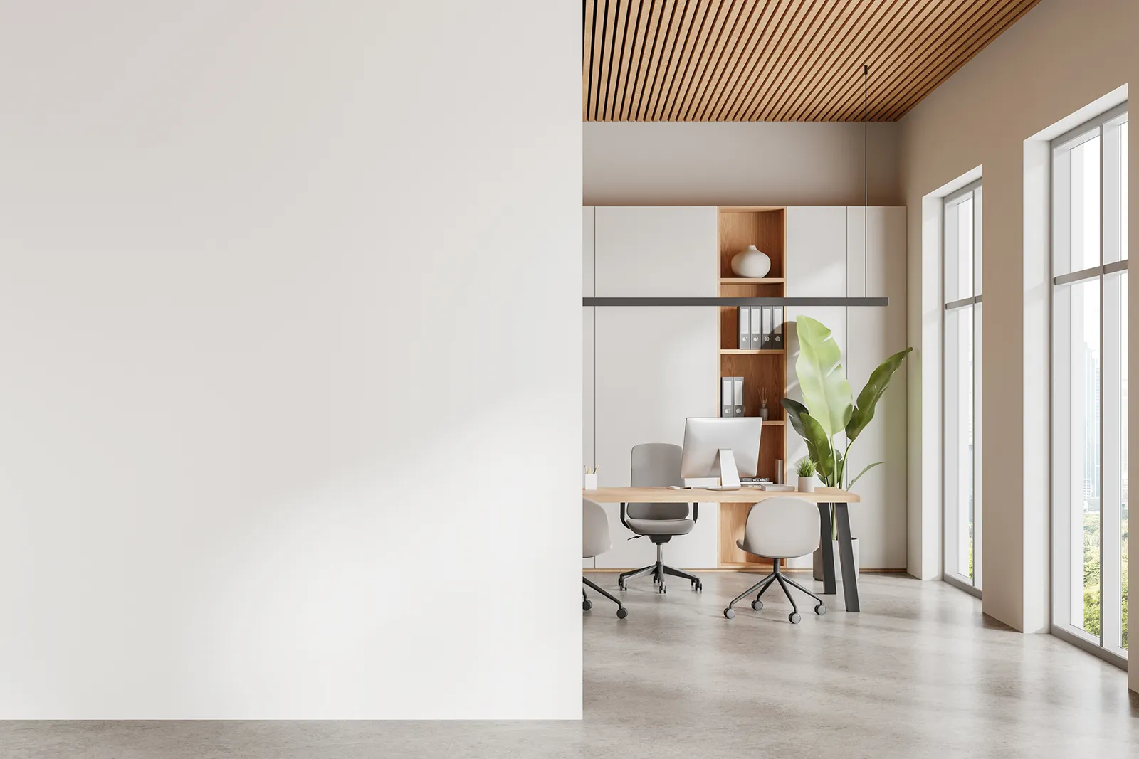Roller applying color to a commercial interior wall